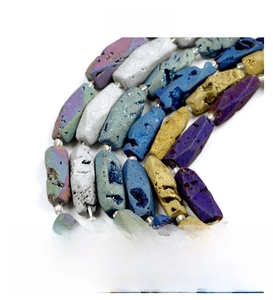 Macro detail of rainbow titanium coated druzy agate stones in octagonal bar shape