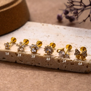 G23 titanium flat back studs with gold plating and cubic zirconia in 6 floral designs