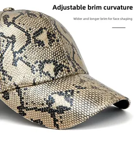Macro view of wide brim baseball cap with golden snakeskin texture and foldable brim
