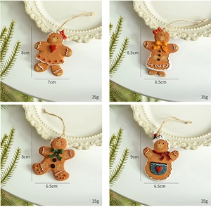 Detailed view of gingerbread man Christmas ornaments with specific size and weight dimensions
