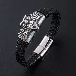 Men's braided black leather bracelet with silver owl motif and magnetic clasp closure