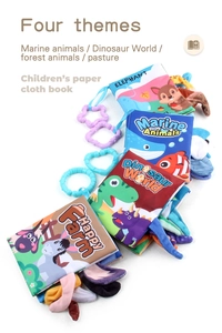 Detailed view of soft baby cloth books with colorful sensory tails and hanging rings