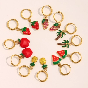 Macro shot of 6 pairs of fruit enamel charms on 18K gold plated stainless steel hoops