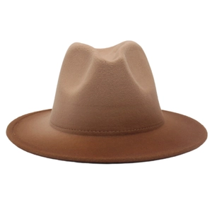 Detail view of the brown wool felt fedora showing the gradient finish and smooth texture