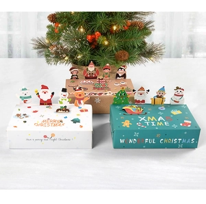Three assorted 3D Christmas gift boxes in white, green and kraft with festive illustrations