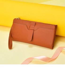 Women long wallet brown PU leather clutch bag with wrist strap, fashion card holder purse detail.