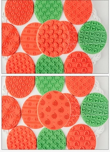 Detailed view of red and green round Christmas fondant stamps with festive patterns