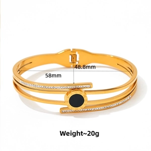 Macro detail of Roman numeral bangle with dimensions of 58mm by 48.8mm and 20g weight