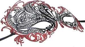 Detail of laser-cut party mask in black and red with rhinestones and ribbon ties