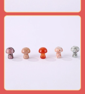 Row of five polished natural stone mushroom pendants in various colors and textures