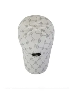 Top view of white baseball cap with DR jacquard letters and heart metal logo detail