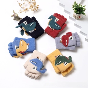 Detail view of children's knit convertible gloves featuring cute 3D cartoon dinosaurs