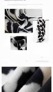 Detailed macro shot of thick imitation cashmere scarf with soft fringe and cow print texture