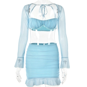 Detail of light blue glitter mesh two-piece set featuring corset top and ruffled mini skirt
