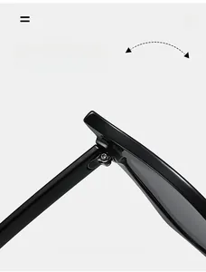 Macro shot of durable silver metal hinge on cat-eye sunglasses with black frames