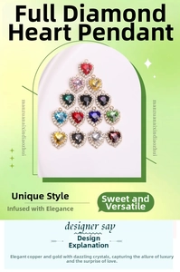 Detailed view of heart-shaped gold-plated crystal pendants with rhinestone encrusted borders