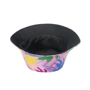 Interior view of pink tropical palm print bucket hat with durable black canvas lining