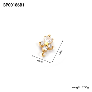 Gold floral stainless steel pendant with sparkling cubic zirconia, 1.6cm length