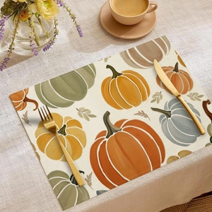Autumn pumpkin print placemat with woven texture and artistic Thanksgiving table decor