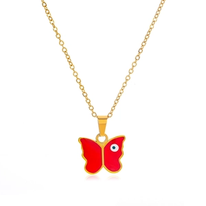 Minimalistische Goldkette aus Edelstahl mit rotem Schmetterlingsanhänger und blauem Auge
