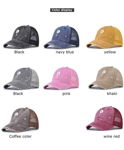 Detail display of distressed mesh trucker hats in eight colors with daisy embroidery