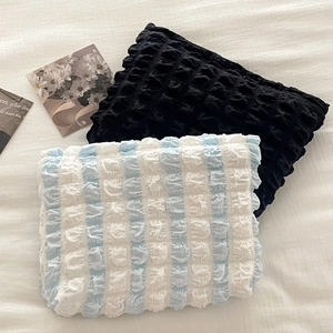 Puffy bubble sleeve storage bags in black and blue stripe, minimalist travel vanity pouches