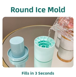 Detail of pouring water into a blue cylindrical silicone ice mold for quick ice making