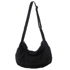 Japanese style washed canvas messenger bag in black with adjustable shoulder strap