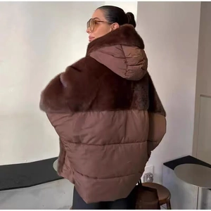 Detailed back view of brown hooded jacket with faux fur trim on the hood and ribbed cuffs