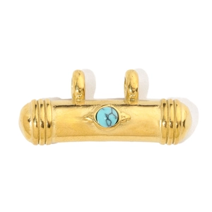 Detail of a vintage gold cylinder pendant featuring a turquoise stone inlay and dual rings