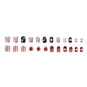 Set of 24 colorful press-on nails with cartoon cat doodles and red checkered patterns