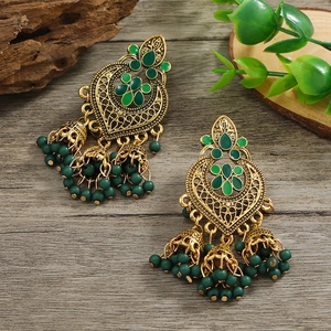 Bohemian gold tassel earrings with green beads and floral enamel detailing