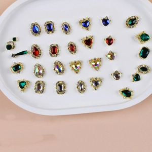 Assorted gemstone heart and oval nail art charms with gold alloy edging and rhinestones
