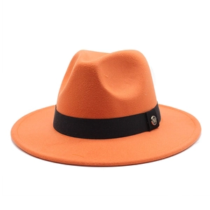 Orange wide-brim wool fedora hat featuring black ribbon and gold M metal emblem