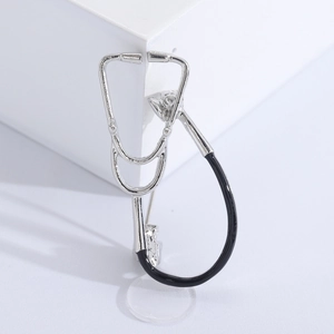 Creative silver stethoscope brooch with black accents for clothing decoration