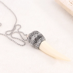 Vintage 85mm resin tusk pendant necklace with rhinestones on a silver bead chain