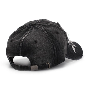Distressed black denim baseball cap with vintage cross embroidery and washed effect