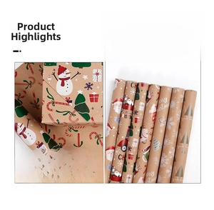 Detail of assorted Kraft Christmas wrapping paper rolls with festive holiday patterns
