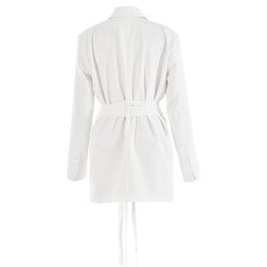 Rear view of white long-sleeve slim blazer featuring adjustable waist ties and back tassels