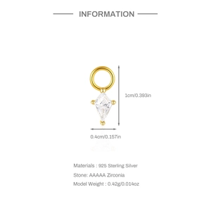 Detail of 925 sterling silver rhombus charm with AAAAA zirconia and gold finish