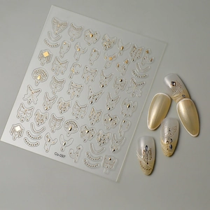 5D embossed gold nail stickers with geometric star and moon patterns on grey background