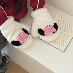 Close-up of soft plush Pochacco style mittens with pink bow and warm neck string