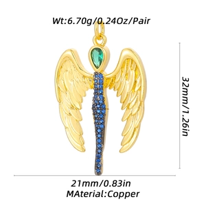 Detailed view of gold angel wing pendant with blue and green gems and size measurements