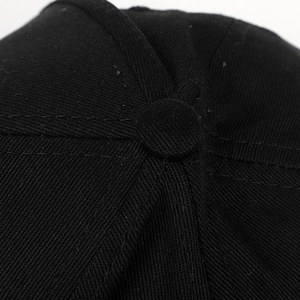 Top view of a black cotton baseball cap showing button detail and reinforced stitching