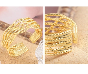 Close-up of S925 hallmark on handmade gold woven lace ring with intricate wire textures