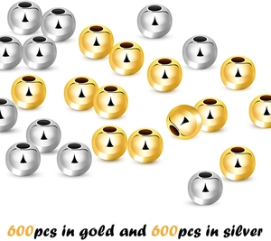Detail showing 600 gold and 600 silver 4mm smooth round metal spacer beads for DIY jewelry