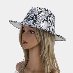 Side view of elegant fedora hat featuring classic black and white snakeskin print pattern