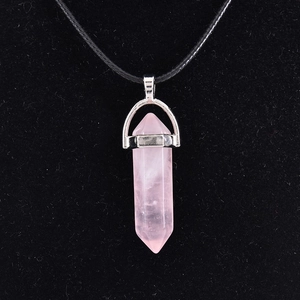Pink quartz hexagonal point pendant necklace with silver clasp on black cord