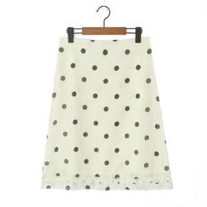 Beige polka dot midi skirt for women with black dots and a slight ruffle hemline