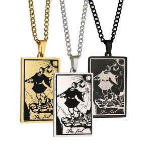 Detailed trio of gold, silver, and black The Fool tarot card pendants on chunky chains